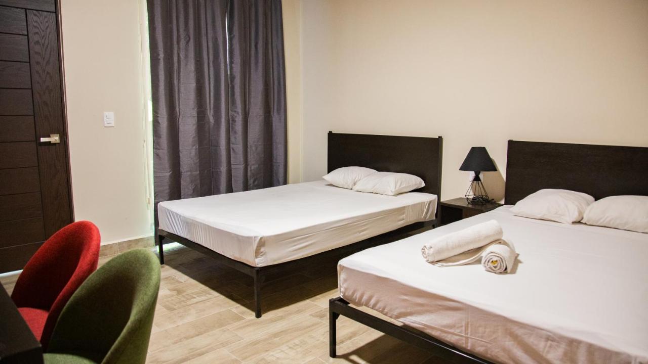 Esduma Iguanas Hotel 신데 델 카르멘 외부 사진
